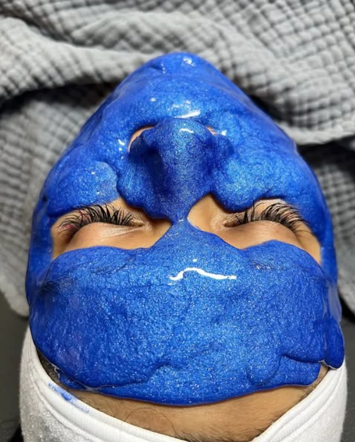 Home 1 a person with blue facial mask