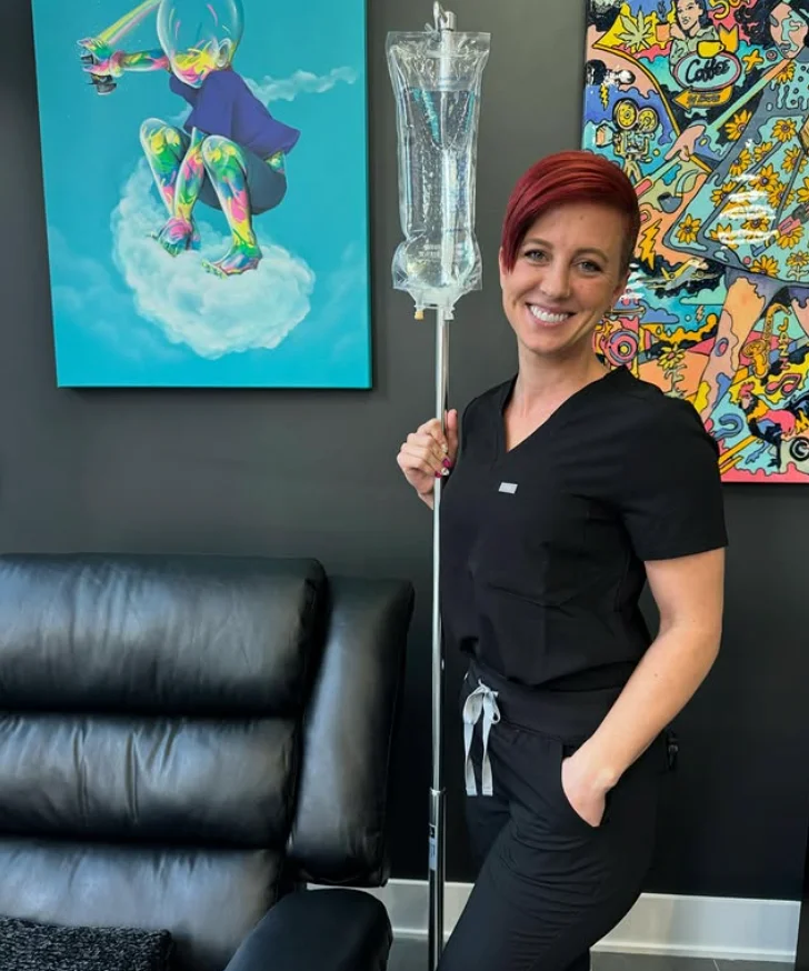 Home 4 a woman holding a drip